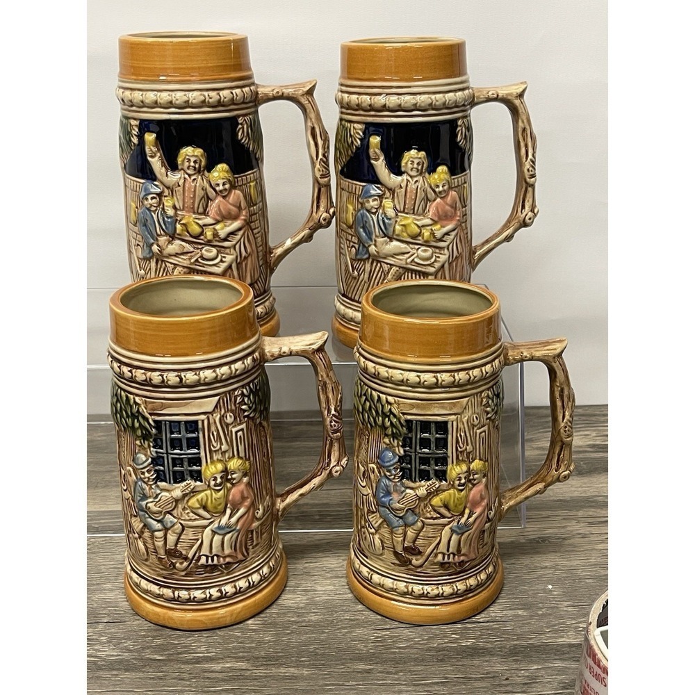 Vintage Japan Ceramic Beer Stein Set 4 Relief Tavern Scene Mugs Brown Blue